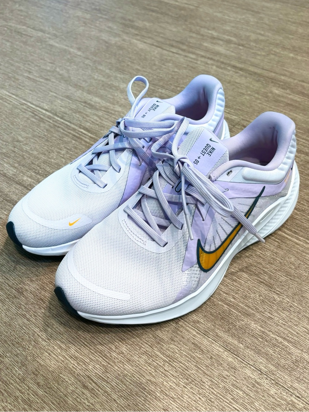 Nike Women's Lavender and Gold Swoosh Running Sneakers
